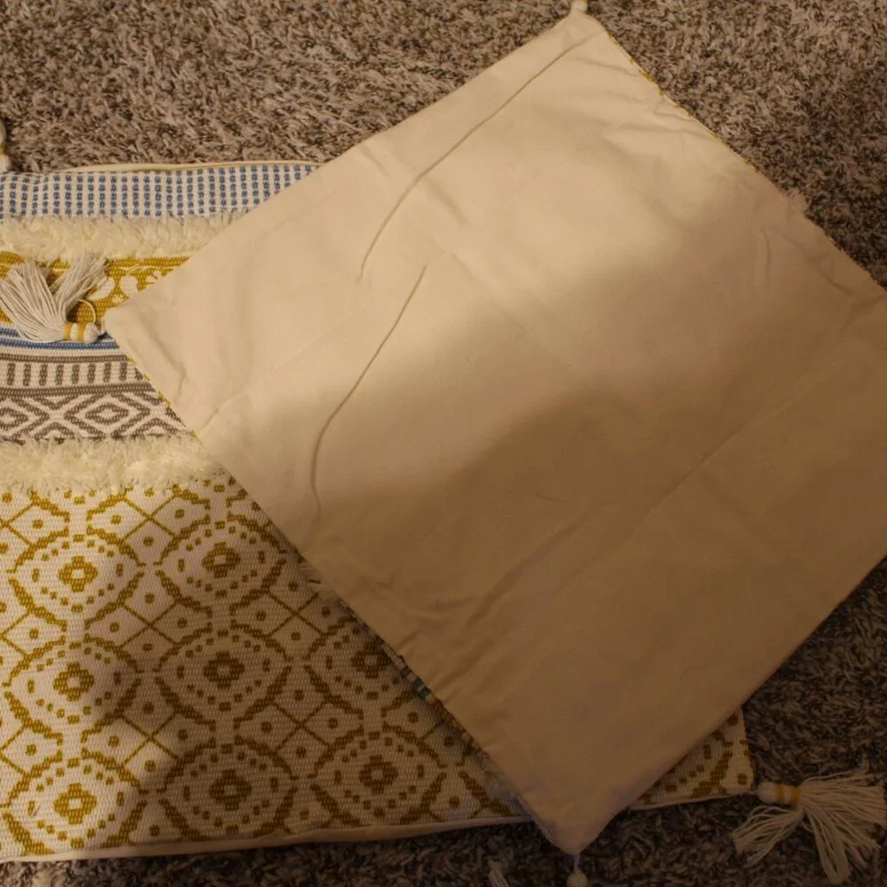 Yellow and white Accent Pillows